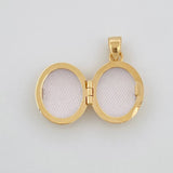 Dije Relicario Ovalo 2.15g / 1.8cm Oro Amarillo 18K