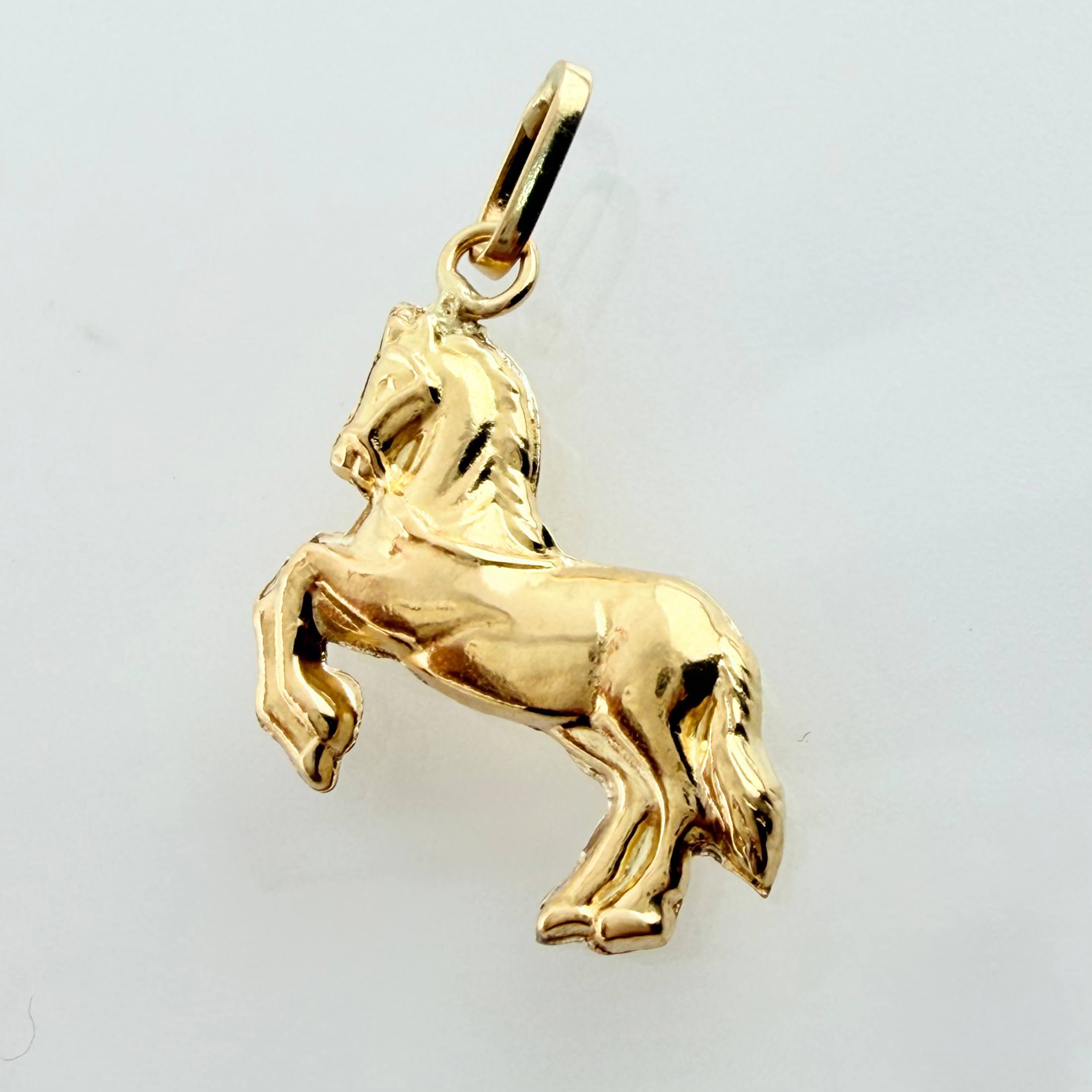 Dije Caballo 0.8gr / 2.2cm / Oro Amarillo 18K