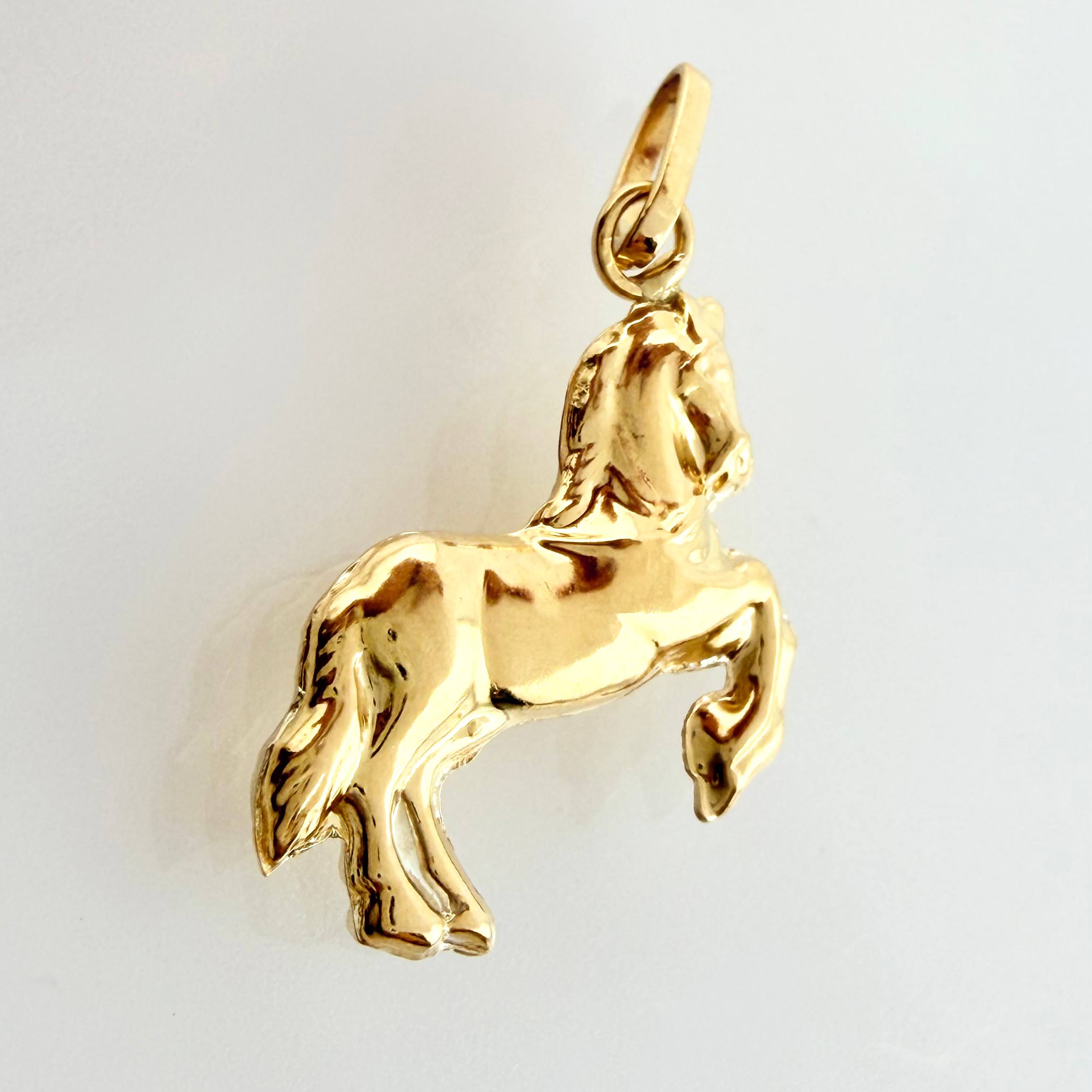 Dije Caballo 0.8gr / 2.2cm / Oro Amarillo 18K