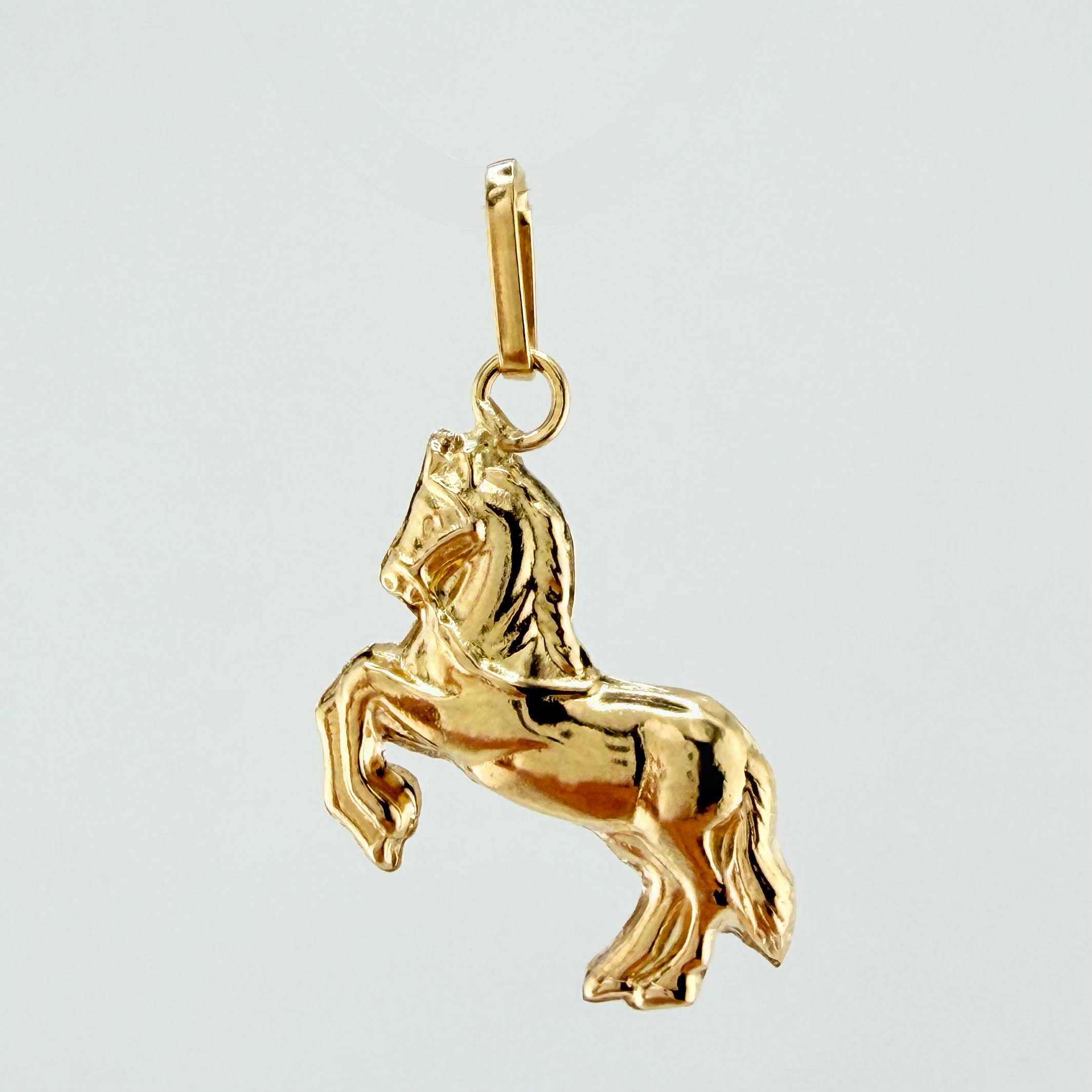 Dije Caballo 0.9gr / 2.2cm / Oro Amarillo 18K