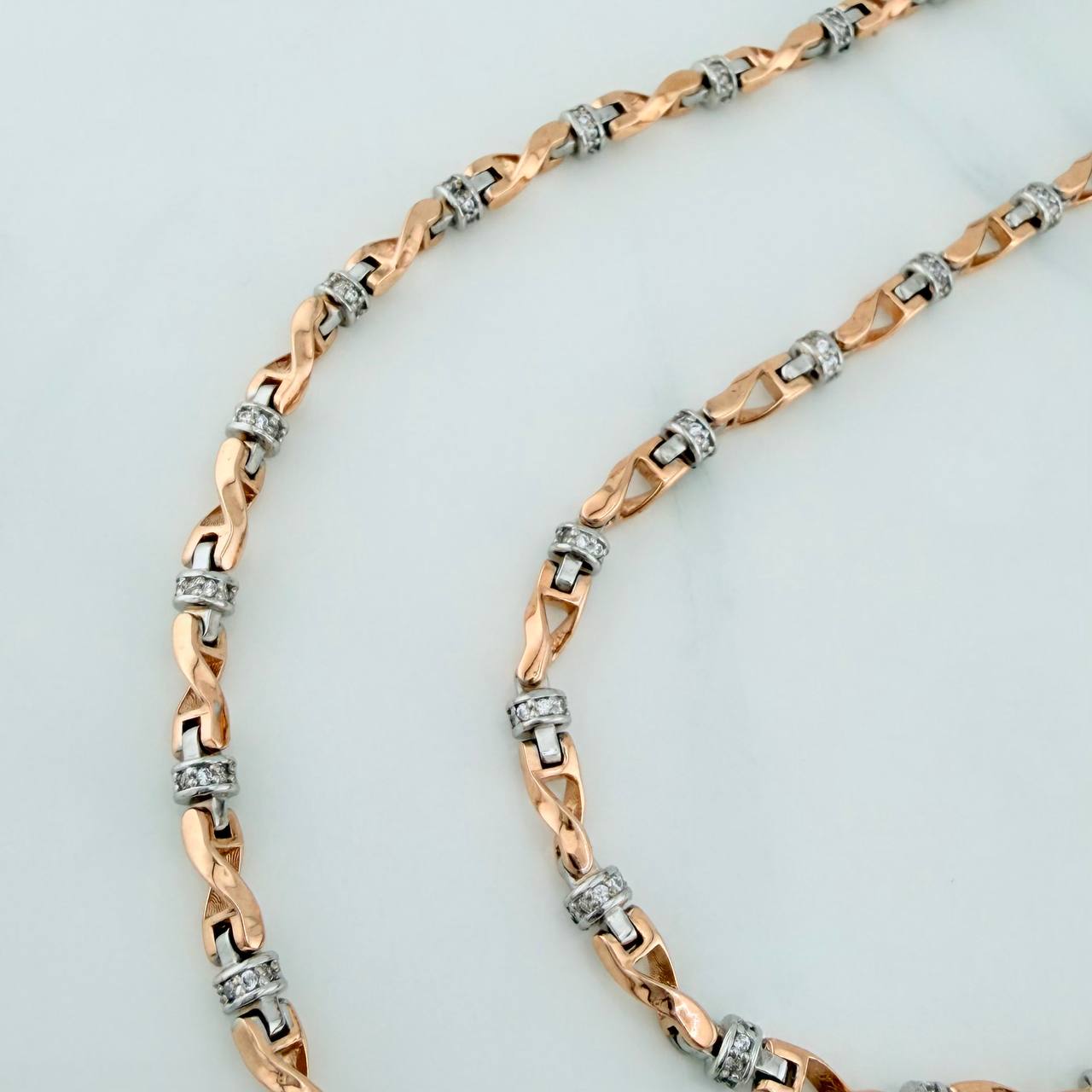 Cadena Rustica Nautilius 51.6gr / 70.6cm / 4.2mm Dos Oros Blanco Rosa 18K $