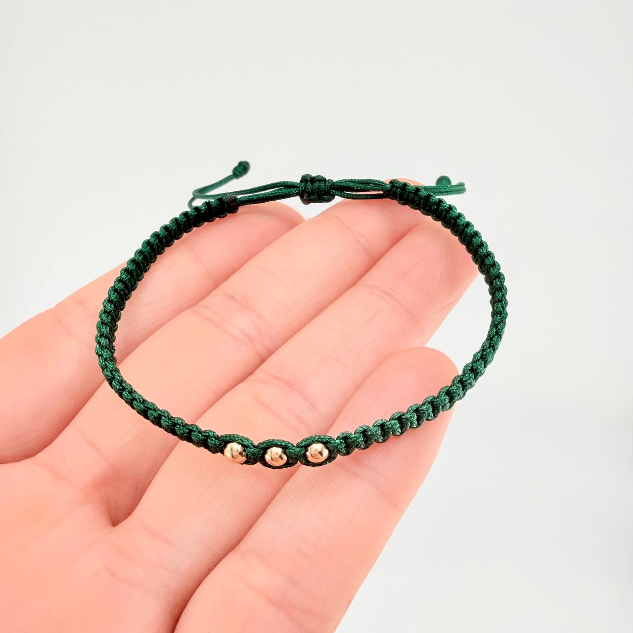 Pulsera Tejida Verde Bolas Lisas Oro Amarillo 18K