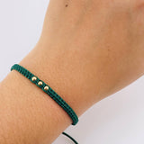 Pulsera Tejida Verde Bolas Lisas Oro Amarillo 18K