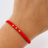 Pulsera Tejida Roja Bolas Lisas Oro Amarillo 18K