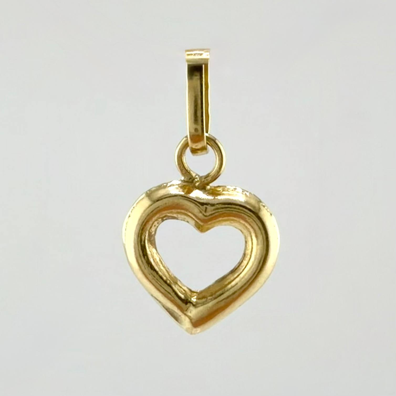 Dije Silueta Corazón 0.4gr / 1.5cm / Oro Amarillo 18K
