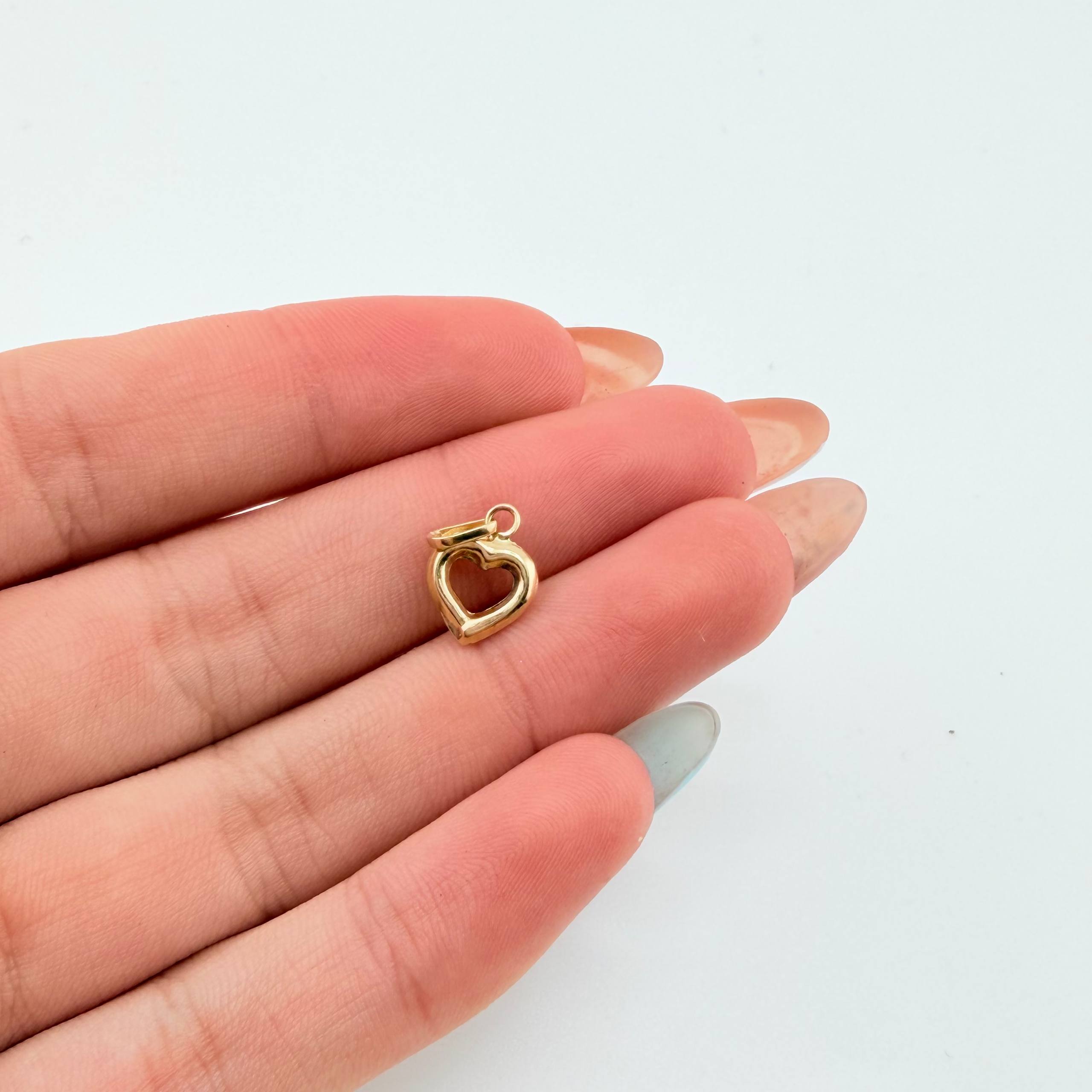 Dije Silueta Corazón 0.4gr / 1.5cm / Oro Amarillo 18K