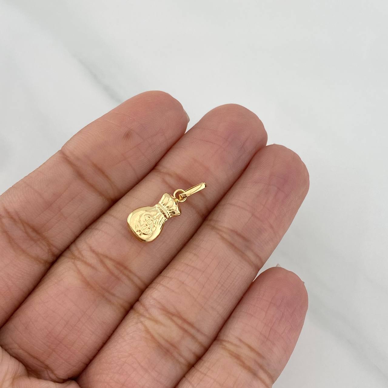 Dije Bolsa de Dinero 0.4g / 2cm Oro Amarillo 18K