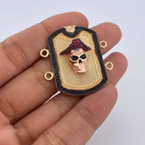 Herraje Placa Calavera 9.5gr / 3.5cm / Circones Fucsias Negro Dos Oros Negro Amarillo 18K &