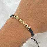 Pulsera Negra Retazo Rustico 1.3gr / Cauchos Negros Oro Amarillo 18K ©