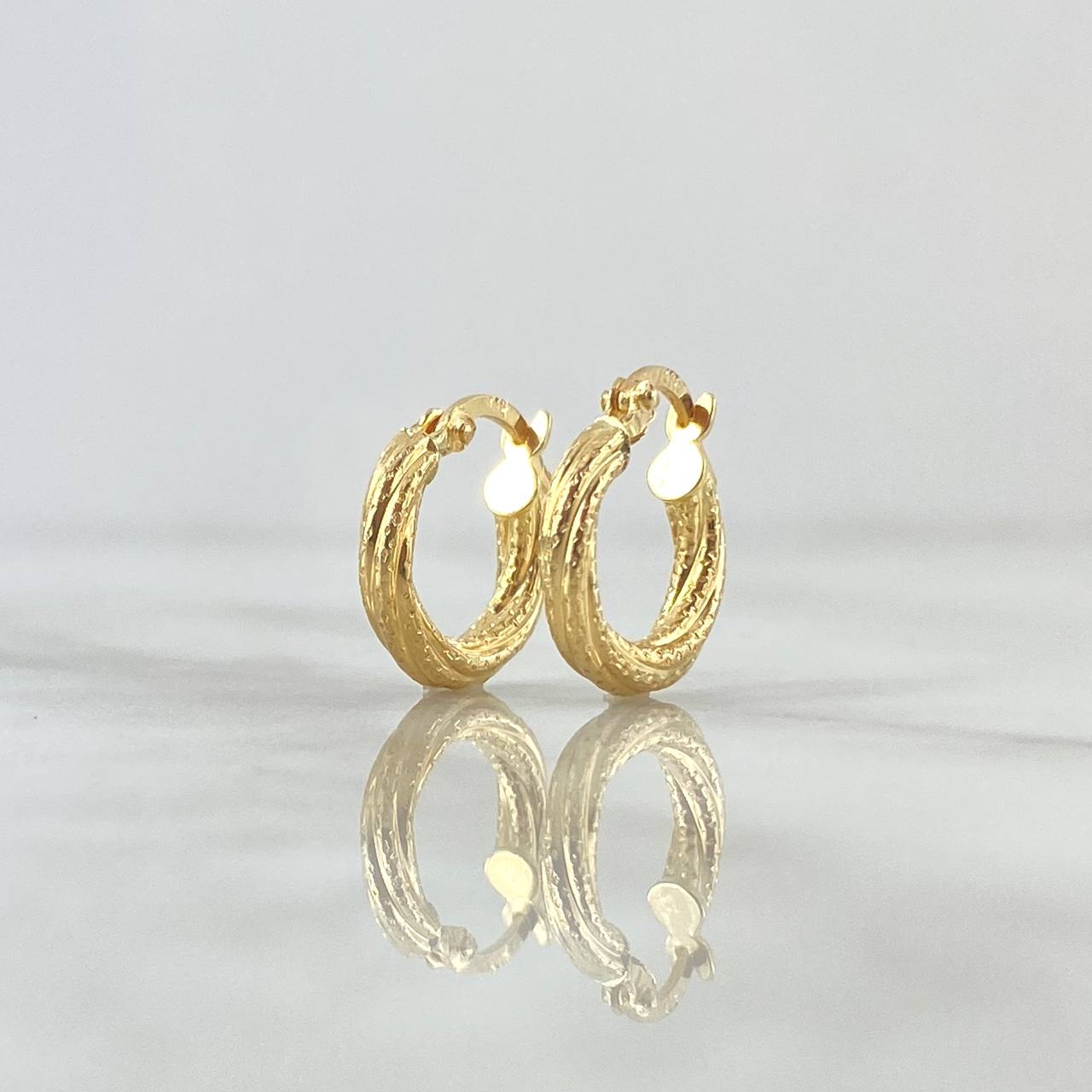 Candongas Carly 1.4gr / 1.5cm / Punteadas Oro Amarillo 18K