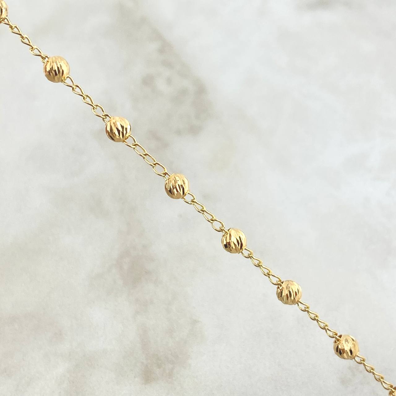 Pulso Espiga 2.7gr / 18cm / 4mm Bolas Diamantadas Oro Amarillo 18K