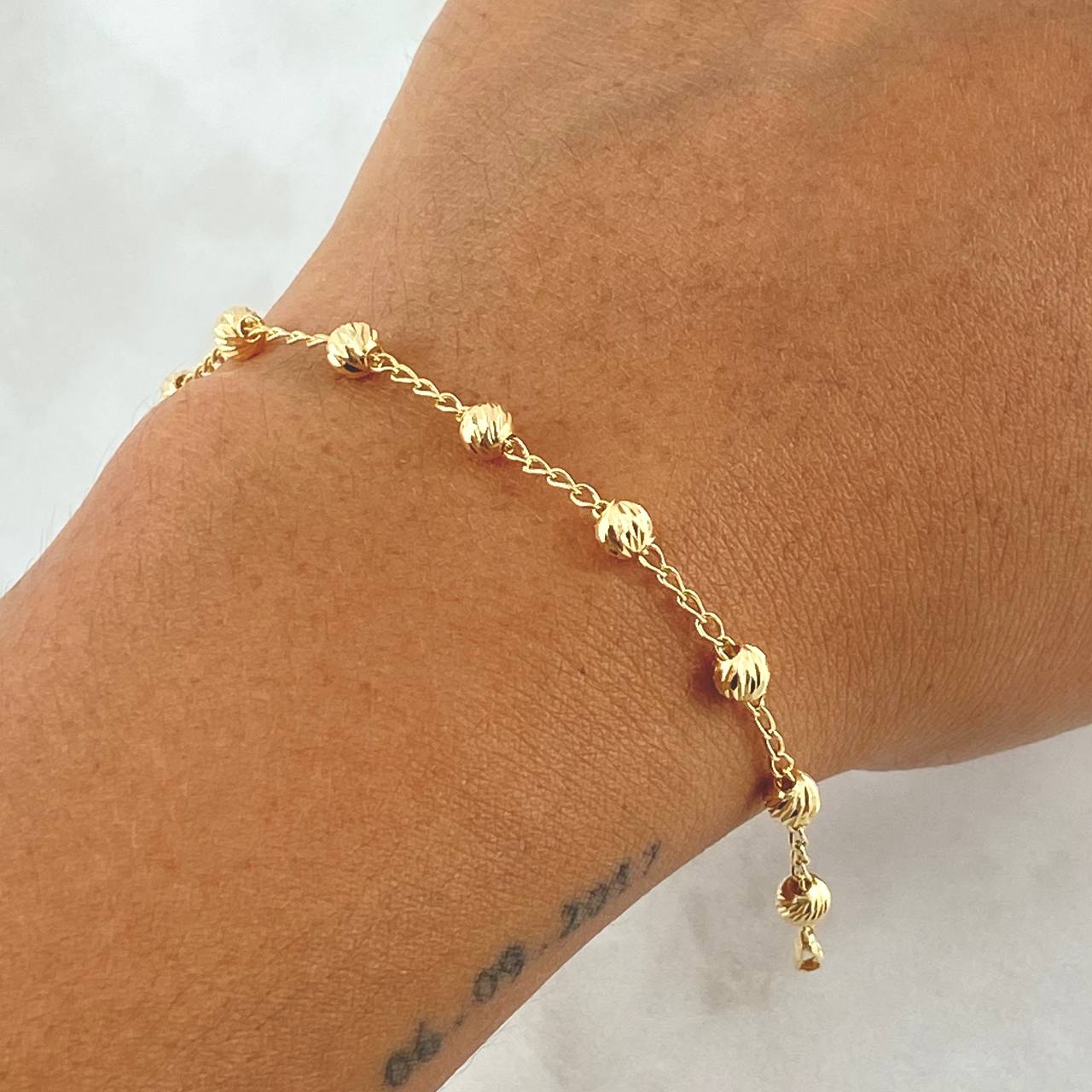 Pulso Espiga 2.5gr / 18cm / 4mm Bolas Diamantadas Oro Amarillo 18K