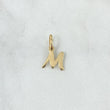 Dije Letra M Cursiva 0.5gr / 1.6cm / Oro Amarillo 18K