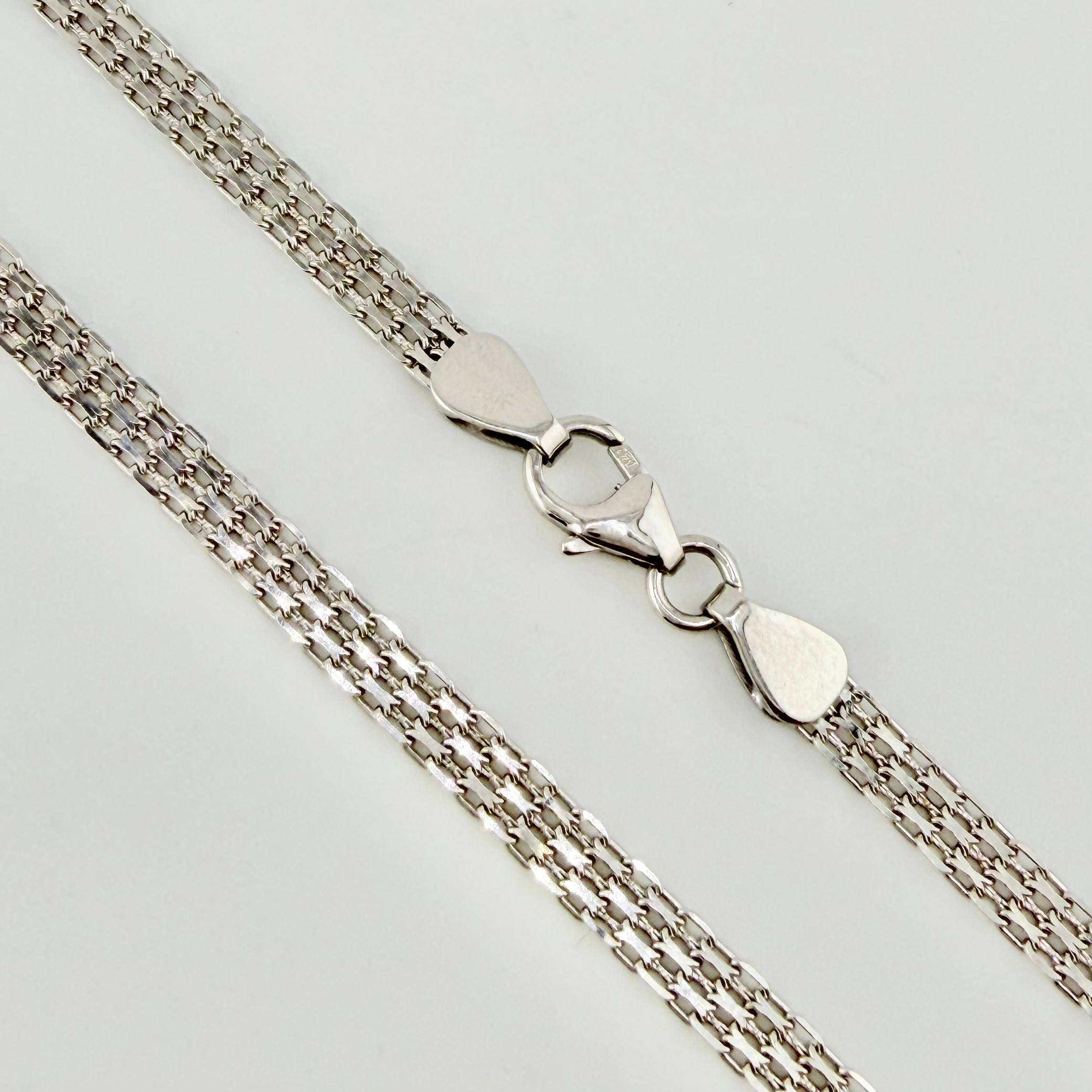 Cadena China 9.1gr / 60cm / 3.3mm Oro Blanco +1 18K ©