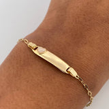 Pulso Bebé Cajon Corazon Tornasol 1.45gr / 13.1cm-14.5cm / 1.6mm Placa Rectangular Curva Oro Amarillo 18K $