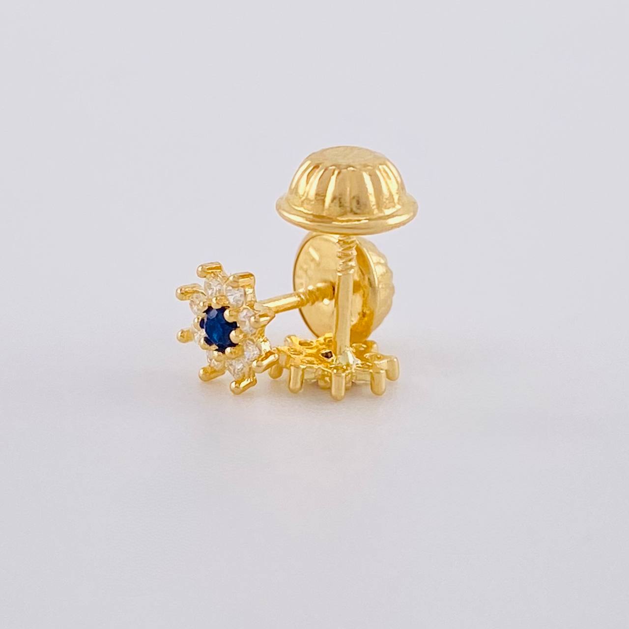 Topos Flor Ocho Petalos 0.85 g / 6.4 mm Oro Amarillo 18K