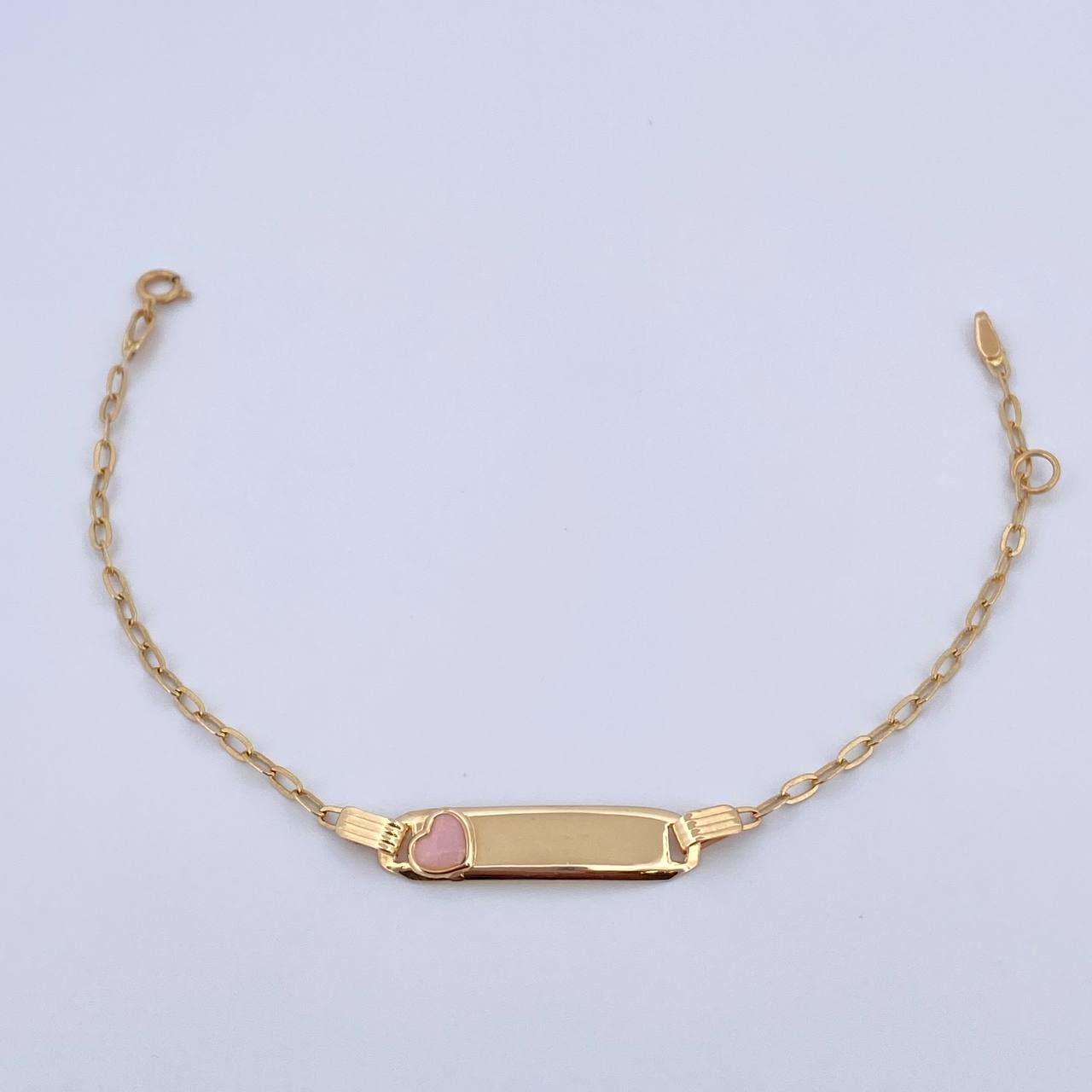 Pulso Bebé Cajon Corazon Rosado 1.4gr / 13.2cm-14.5cm / 1.5mm Placa Rectangular Curva Oro Amarillo 18K &
