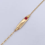 Pulso Bebé Cajon Trebol Rojo 1.45gr / 13.5cm-14.5cm / 1.6mm Placa Rectangular Curva Oro Amarillo 18K $