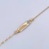 Pulso Bebé Cajon Trebol Celeste 1.4gr / 12.5cm-14cm / 1.5mm Placa Rectangular Curva Oro Amarillo 18K &