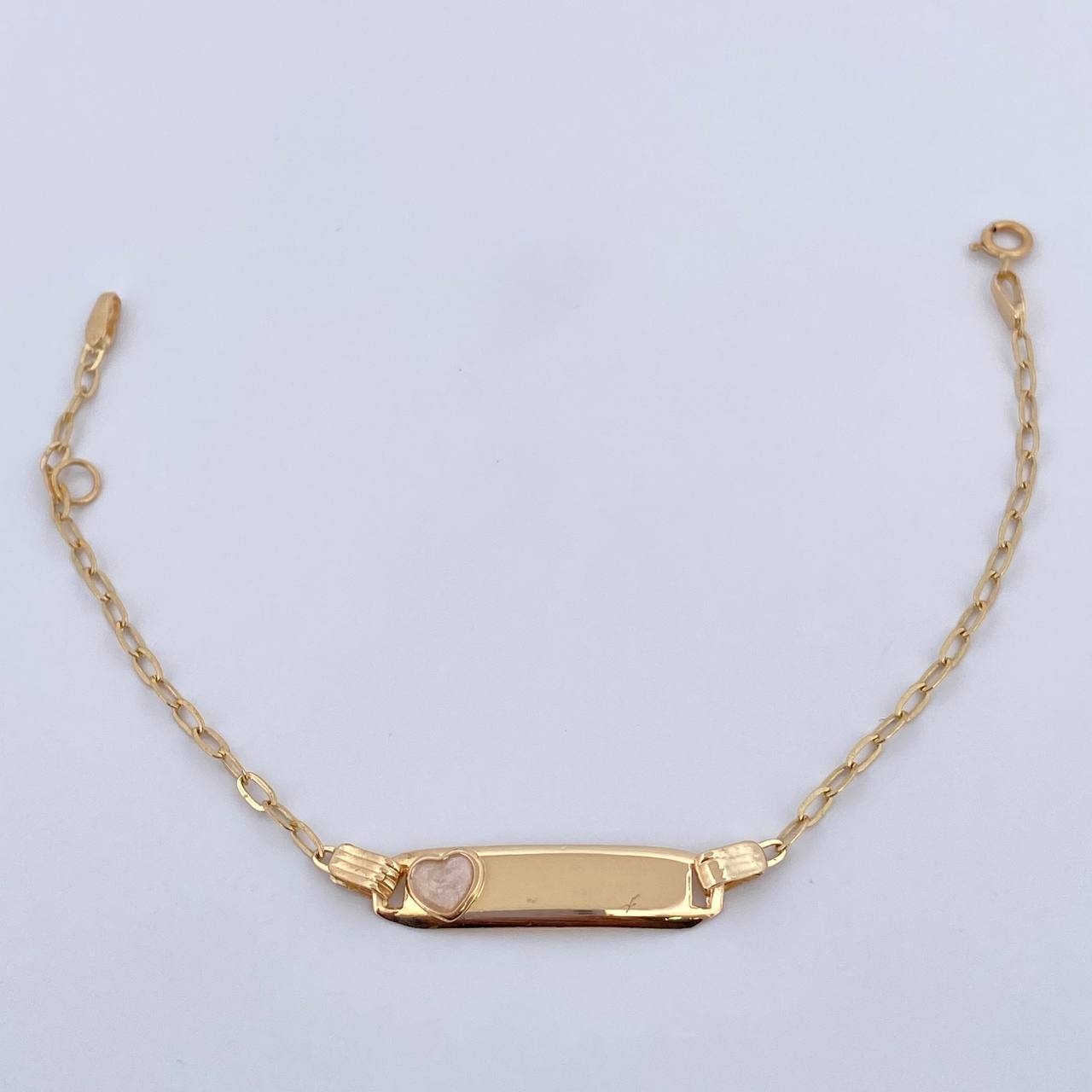 Pulso Bebé Cajon Corazon Tornasol 1.45gr / 13.1cm-14.5cm / 1.6mm Placa Rectangular Curva Oro Amarillo 18K $