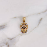 Dije Gorra AD 4.55gr / 2.9cm / Circones Negros Tres Oros 18K $