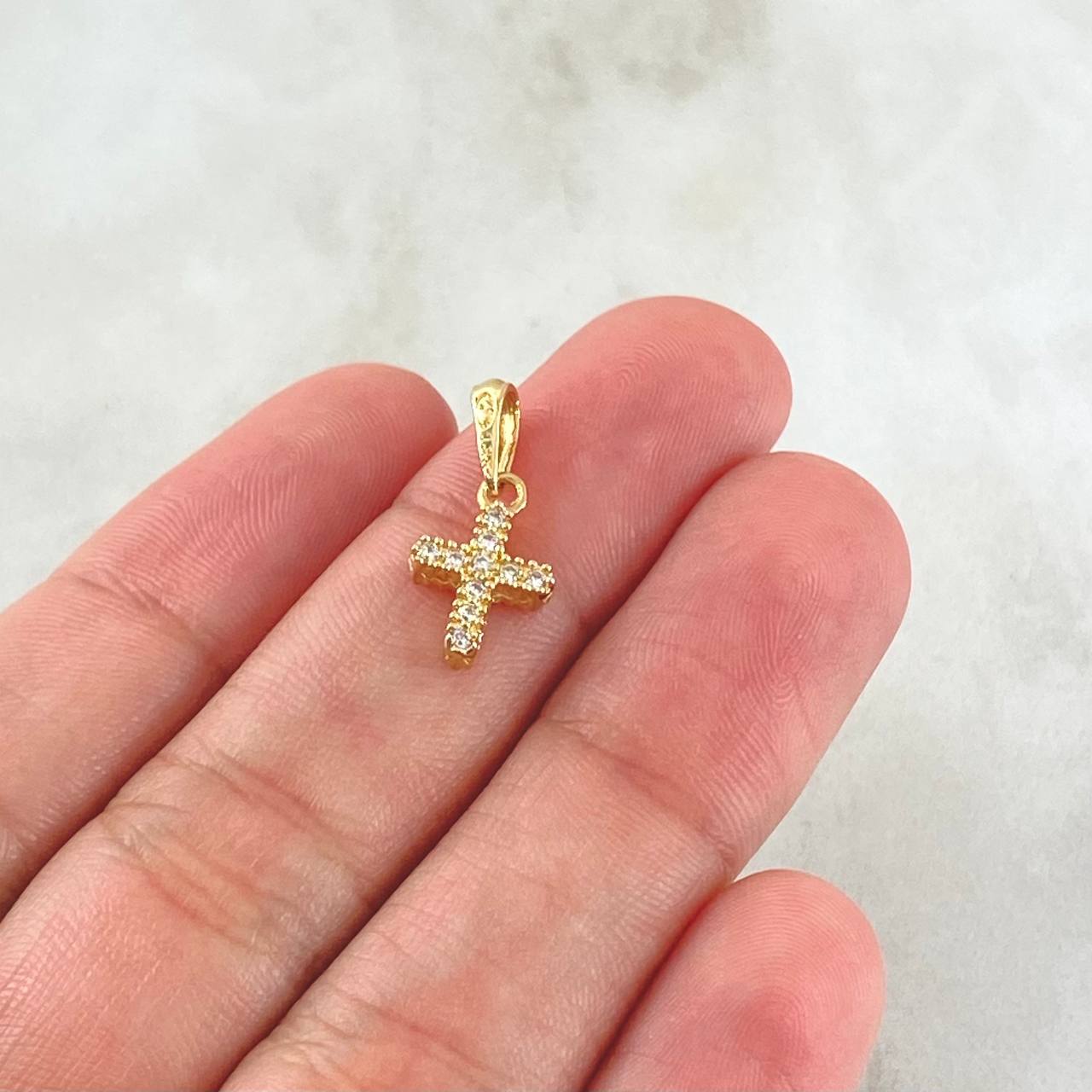 Dije Cruz Tupida 0.95gr / 1.9cm / Oro 18K ©