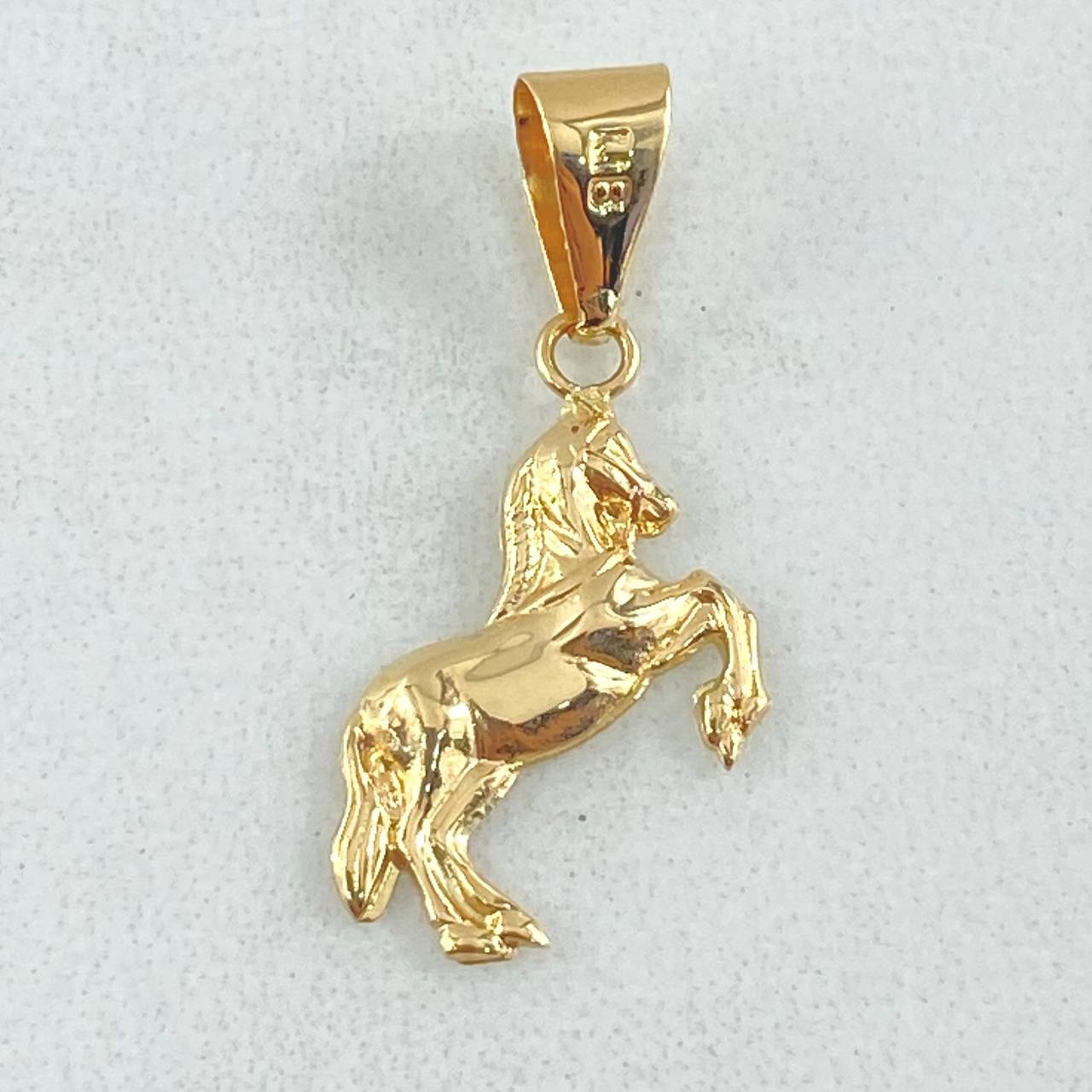 Dije Caballo 0.6gr / 2.5cm / Oro 18K
