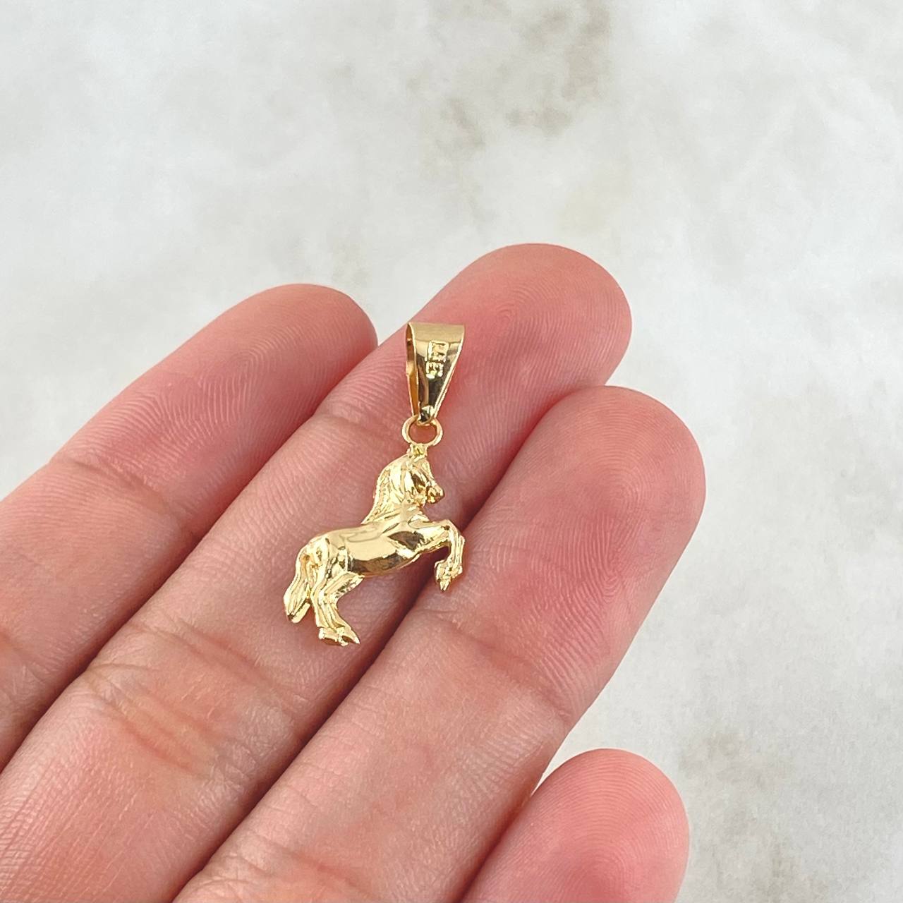 Dije Caballo 0.6gr / 2.5cm / Oro 18K