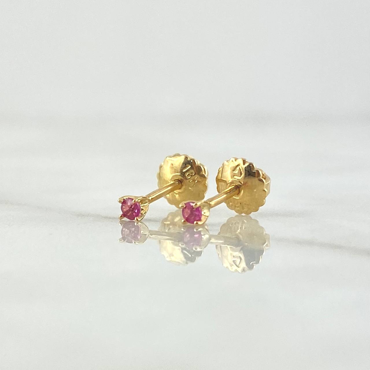 Topos Piedra 0.8gr / 3mm Rubí 9 Pts Oro Amarillo 18K (Joya) *
