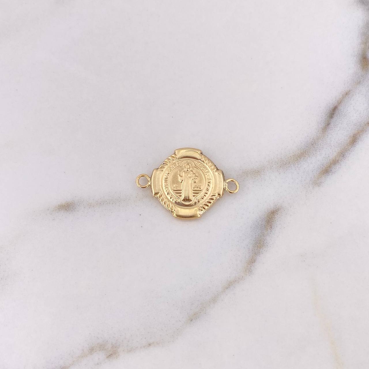 Herraje San Benito 1.15gr / 2.4cm / Troquelado Oro Amarillo 18K $