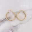 Candongas Nia 4.2gr / 2.9cm / Matizadas Oro Amarillo 18K $
