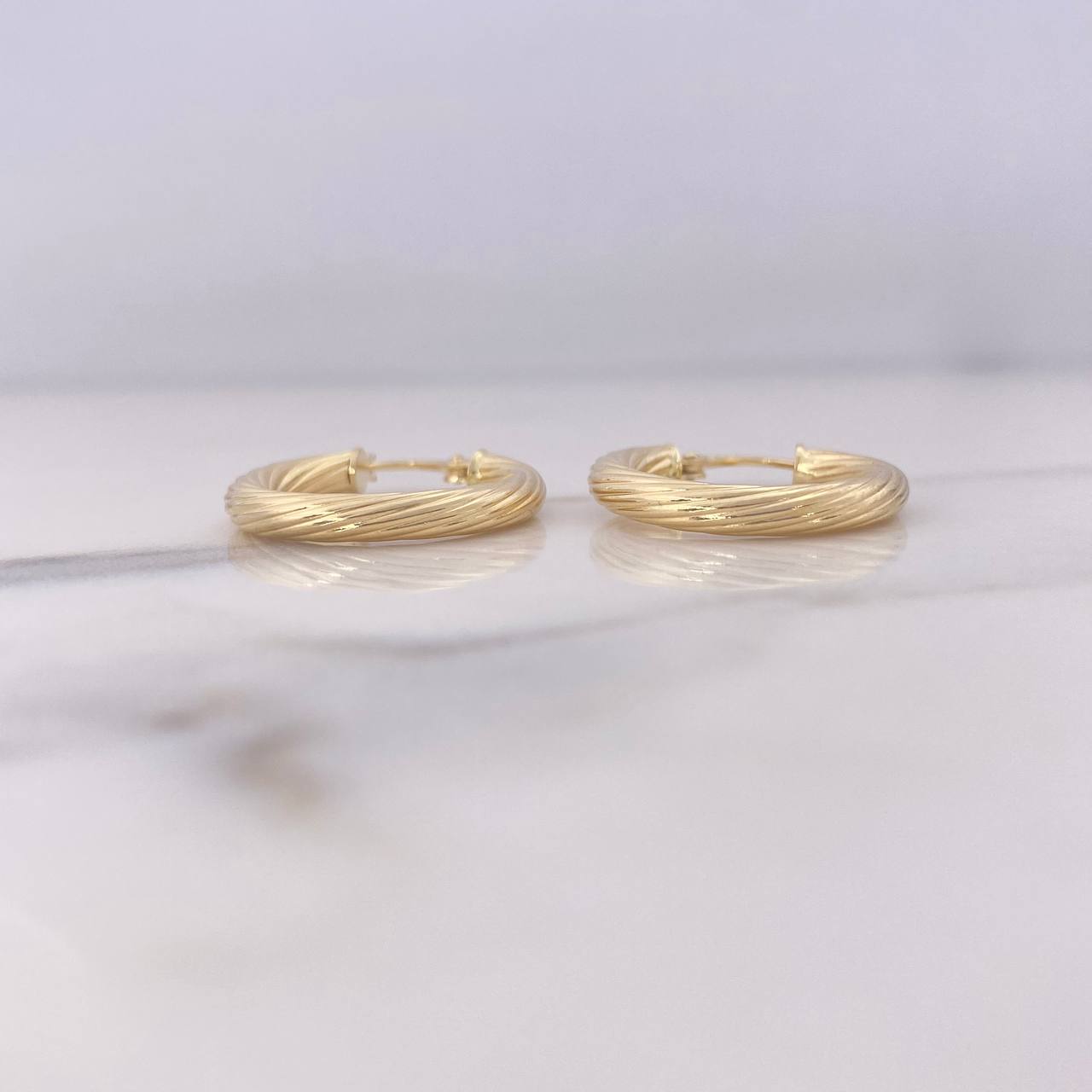 Candongas Sofi 2.3gr / 2.2cm / Espiral Oro Amarillo 18K $