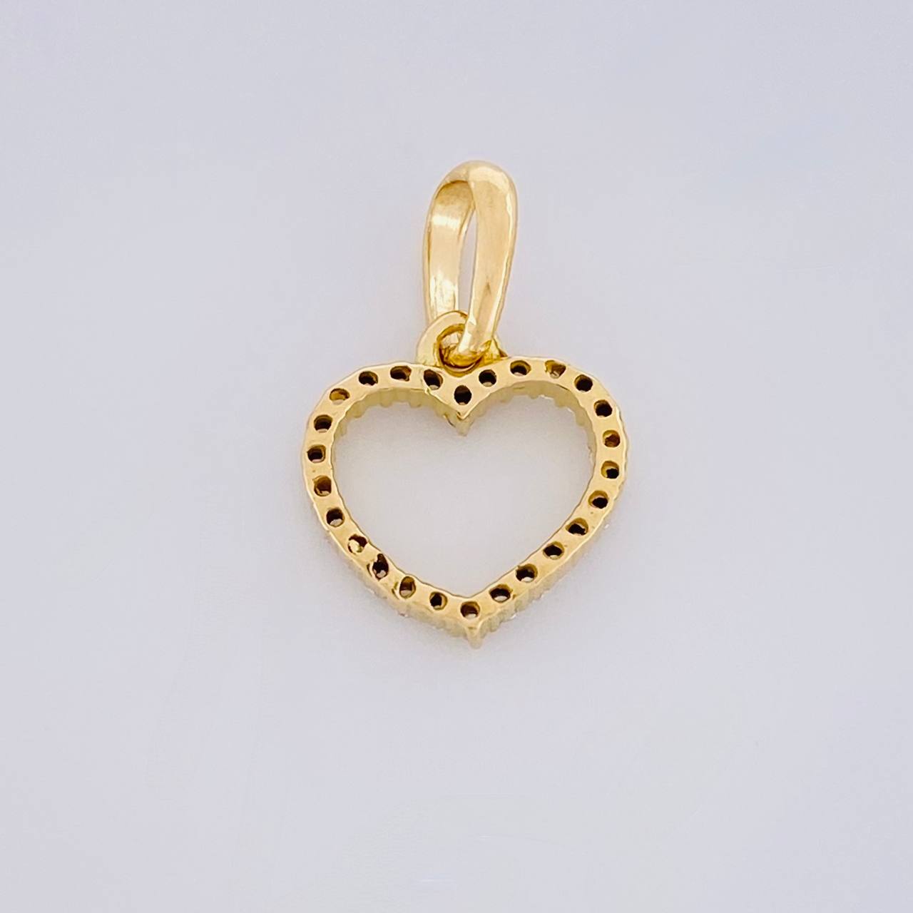 Dije Silueta Corazón 0.6g / 1.4cm Oro Amarillo 18K