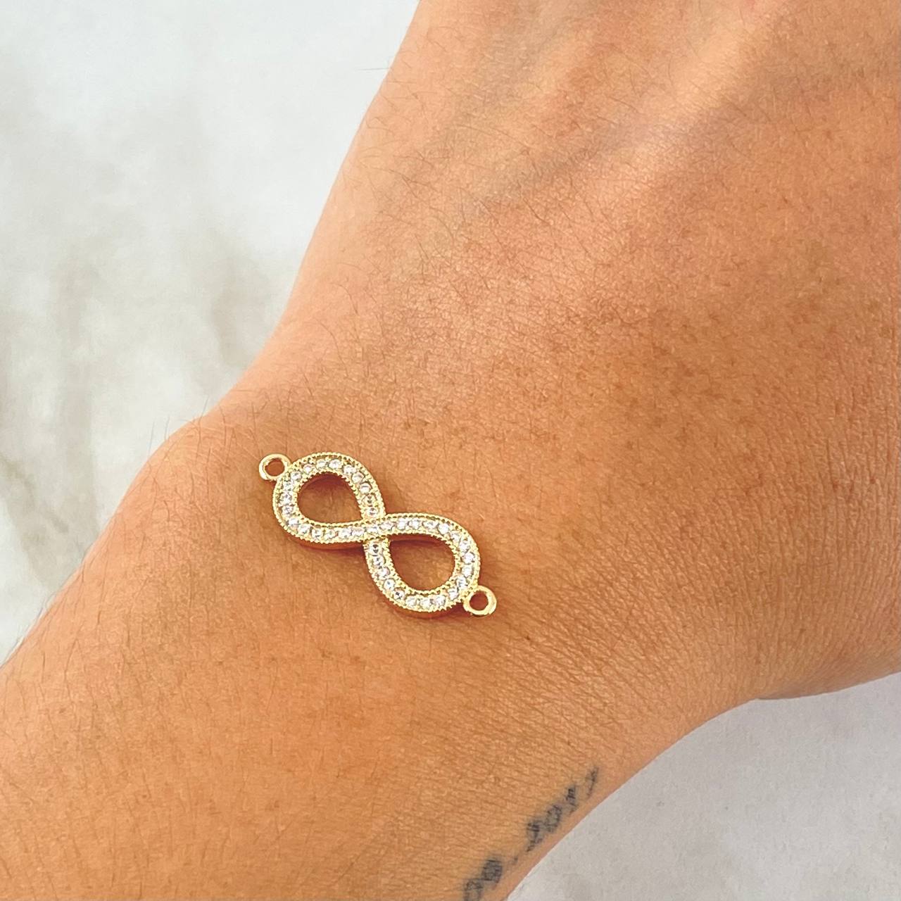 Herraje Infinito 1.4gr / 2.5cm / Oro 18K