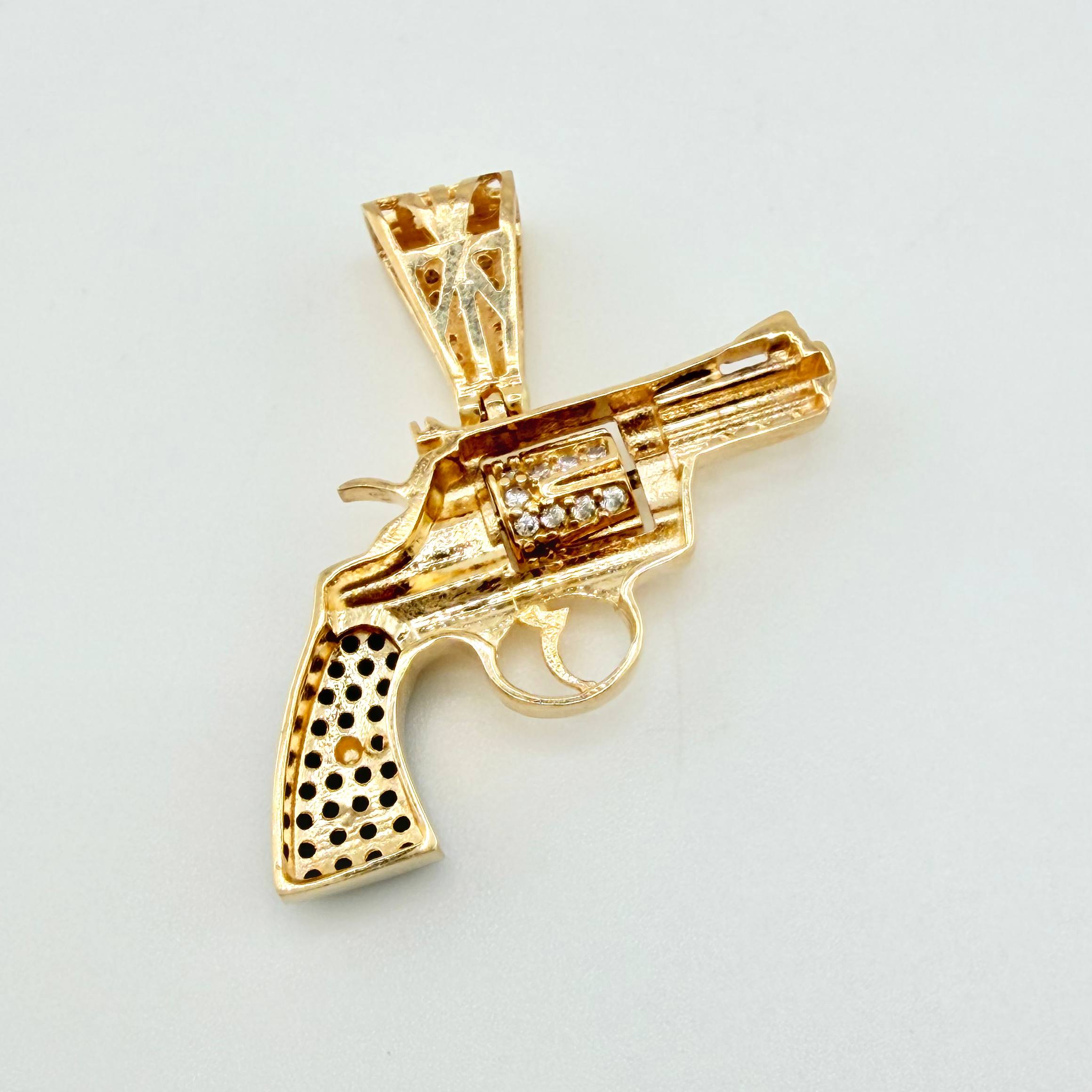 Dije Pistola Movil 4.1gr / 2.7cm / Oro Amarillo 18K