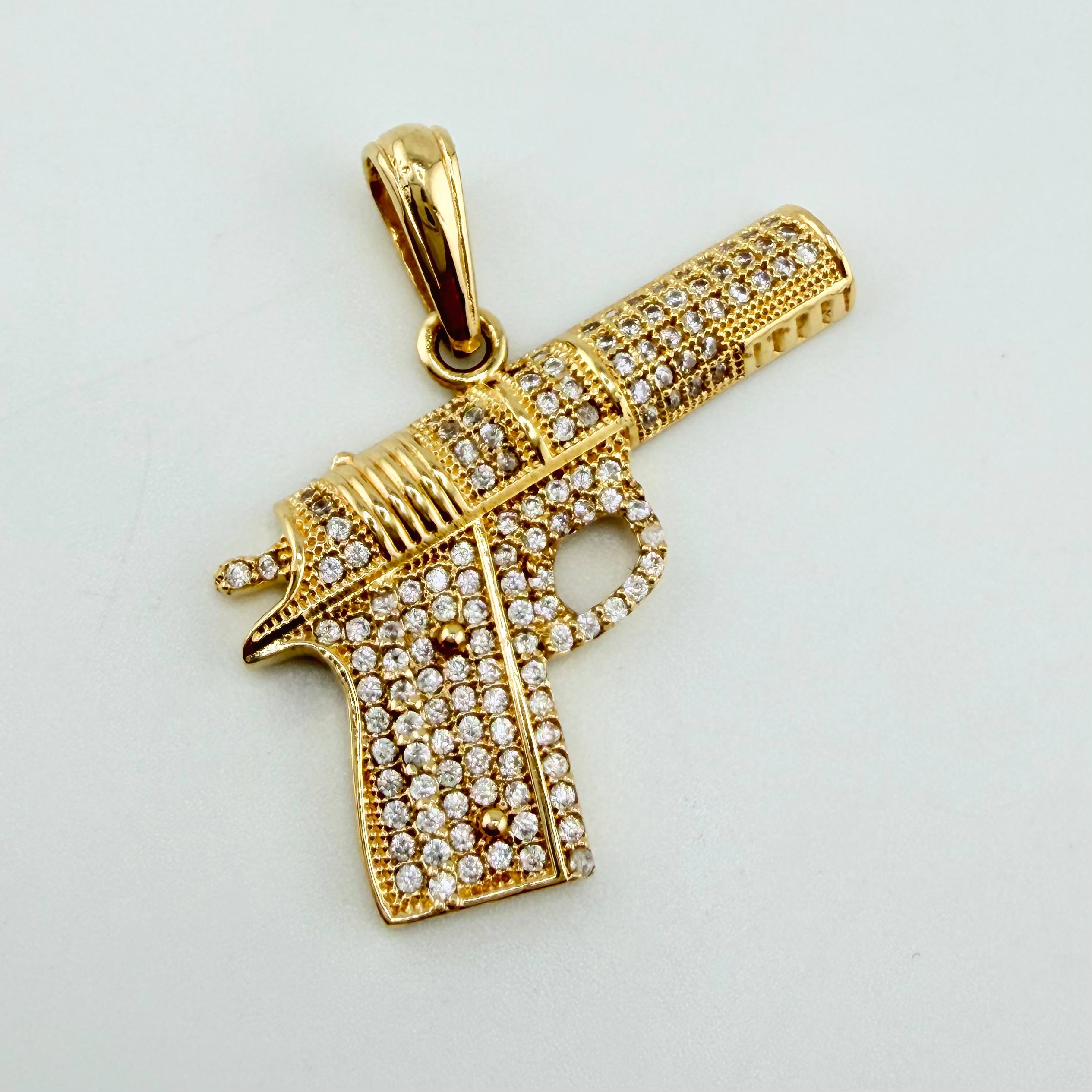 Dije Pistola 4.7gr / 3.1cm / Oro Amarillo 18K ©