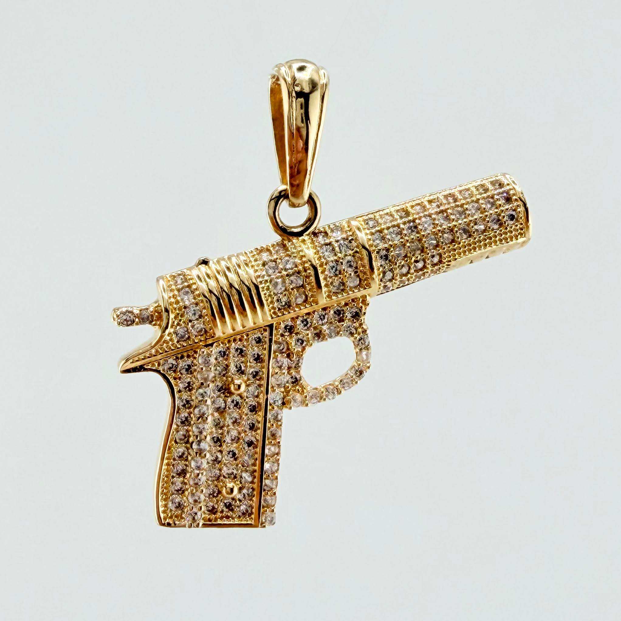 Dije Pistola 4.7gr / 3.1cm / Oro Amarillo 18K ©