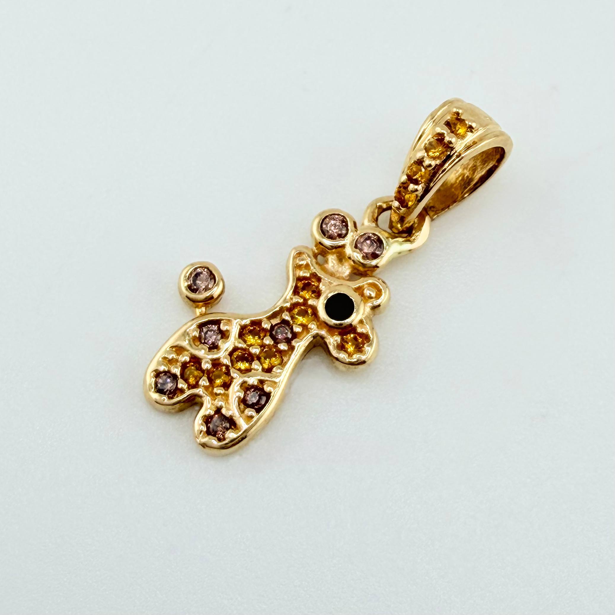 Dije Jirafa 1.1gr / 1.9cm / Oro Amarillo 18K ©