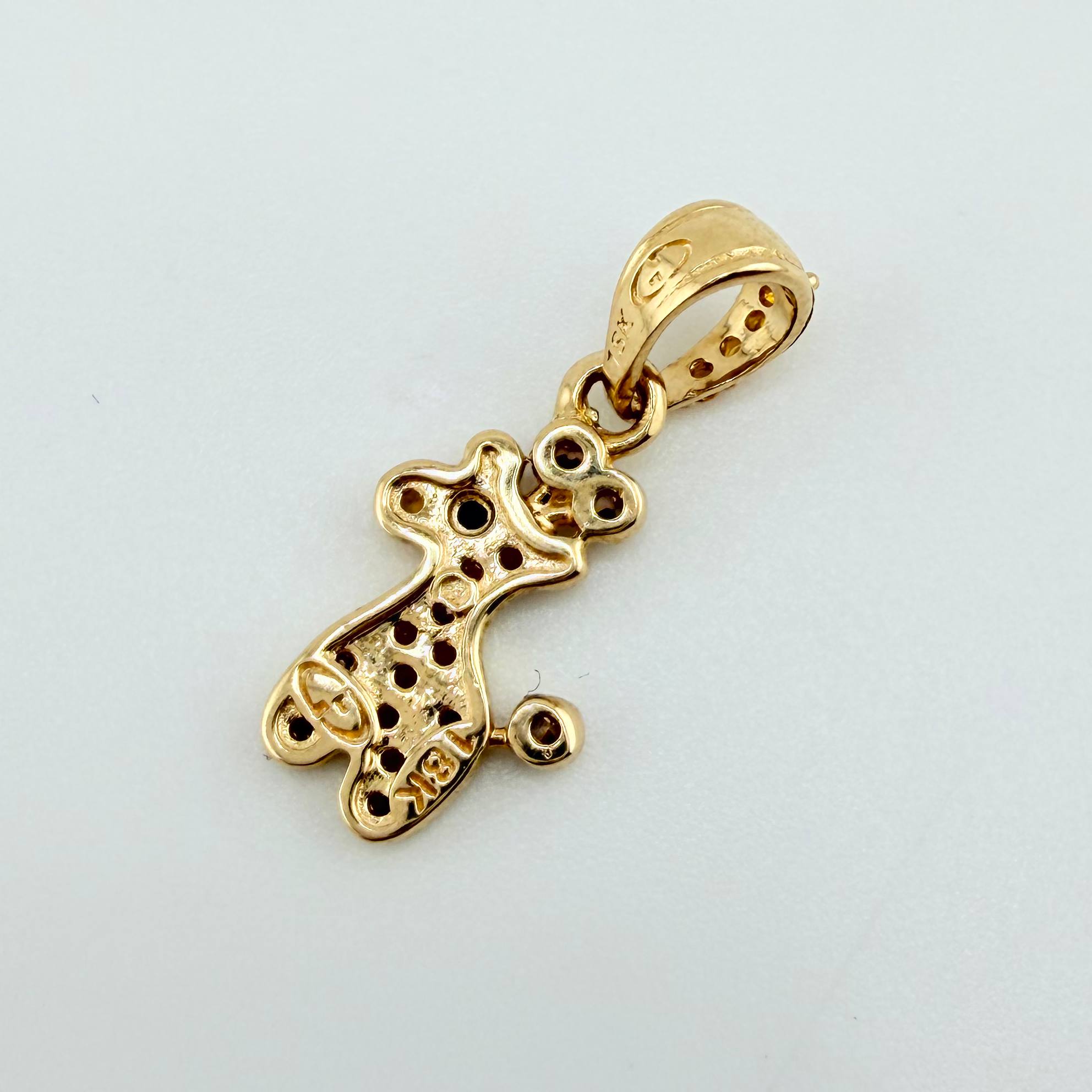 Dije Jirafa 1.1gr / 1.9cm / Oro Amarillo 18K ©