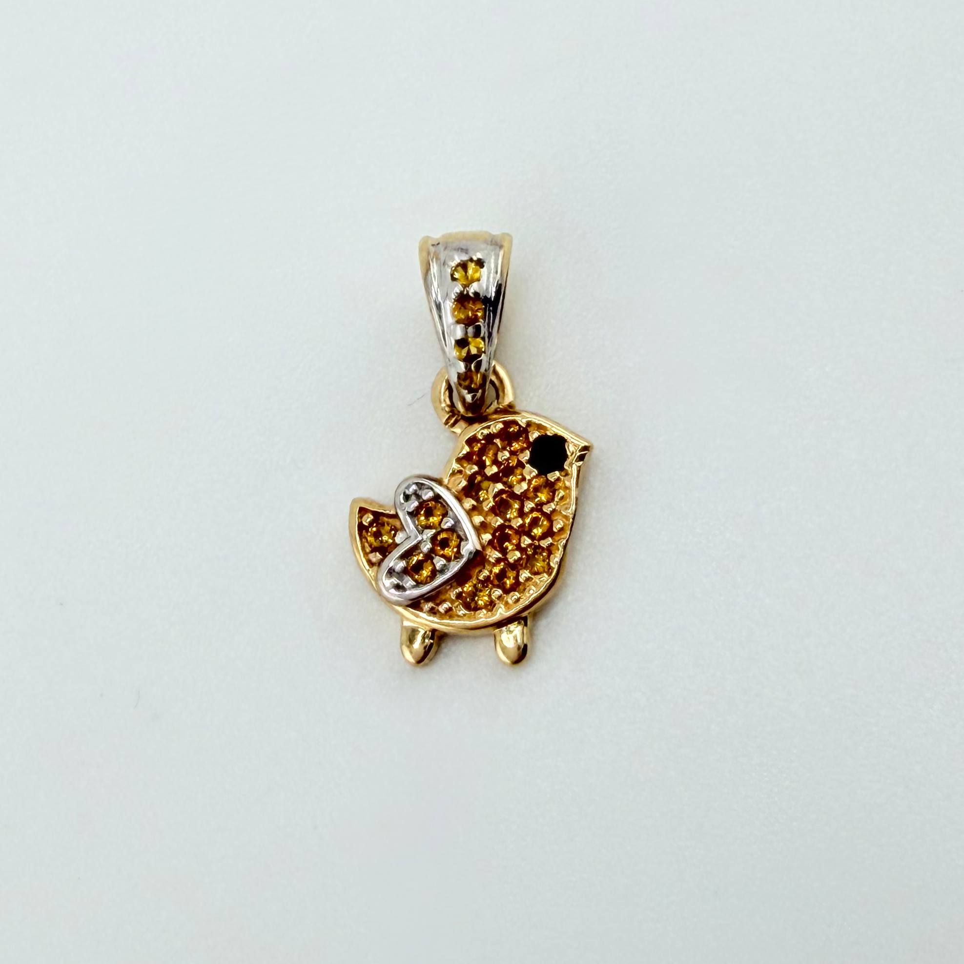 Dije Pajarito 0.95gr / 1.5cm / Dos Oros Amarillo Blanco 18K ©