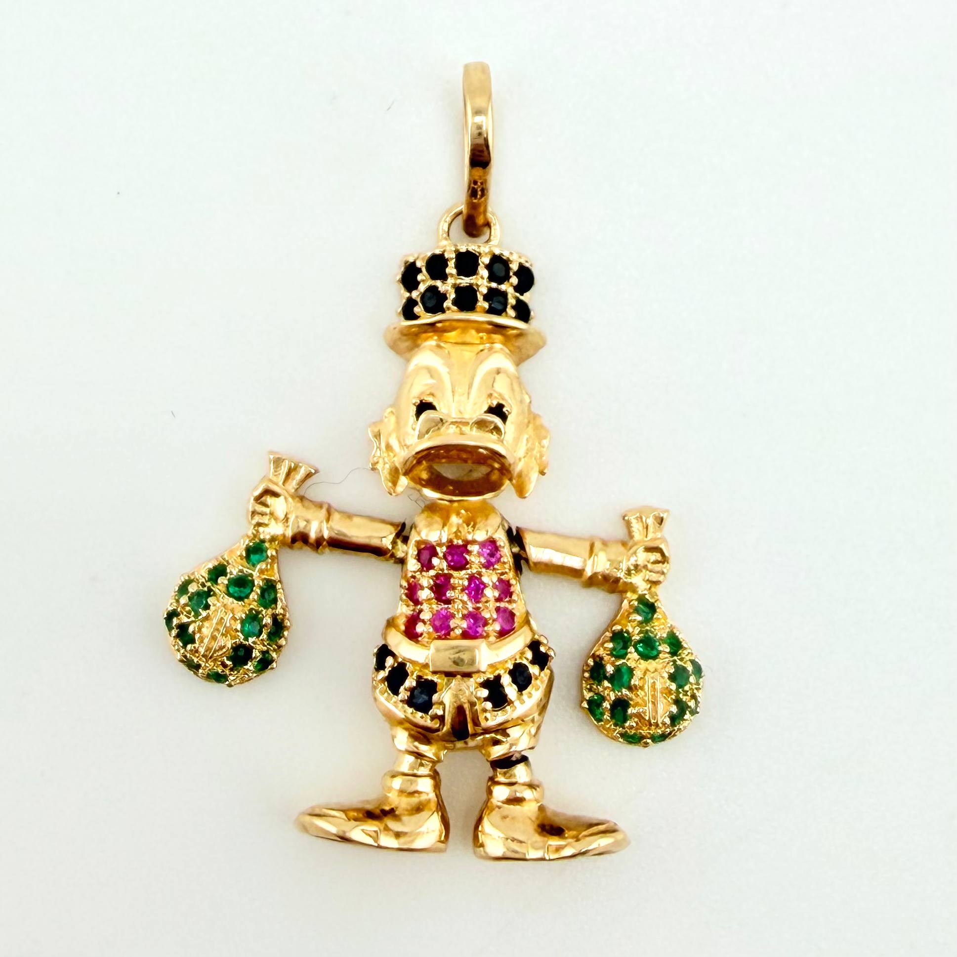 Dije Pato Bolsa Dinero 4.15gr / 3.4cm / Oro Amarillo 18K ©