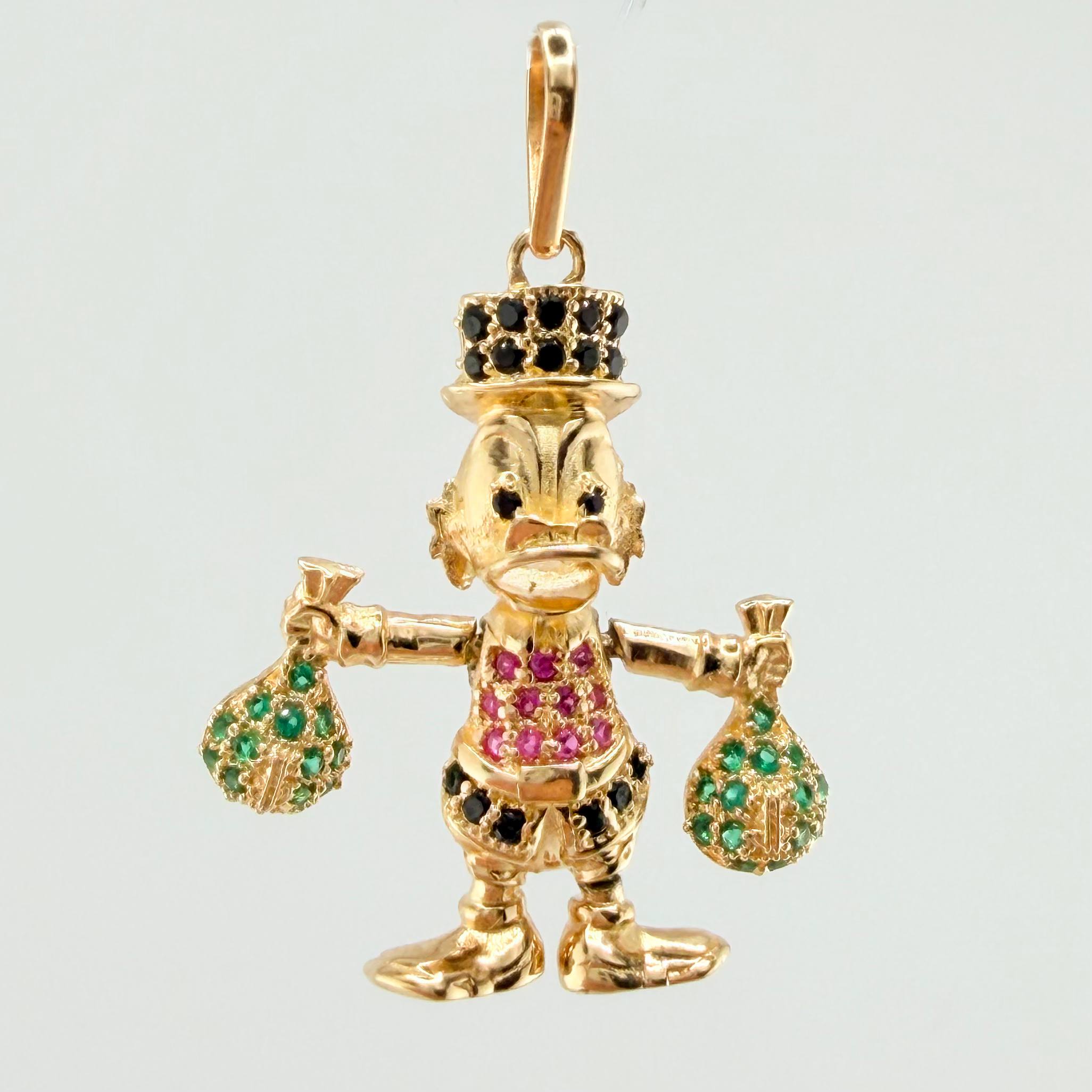 Dije Pato Bolsa Dinero 4.15gr / 3.4cm / Oro Amarillo 18K ©