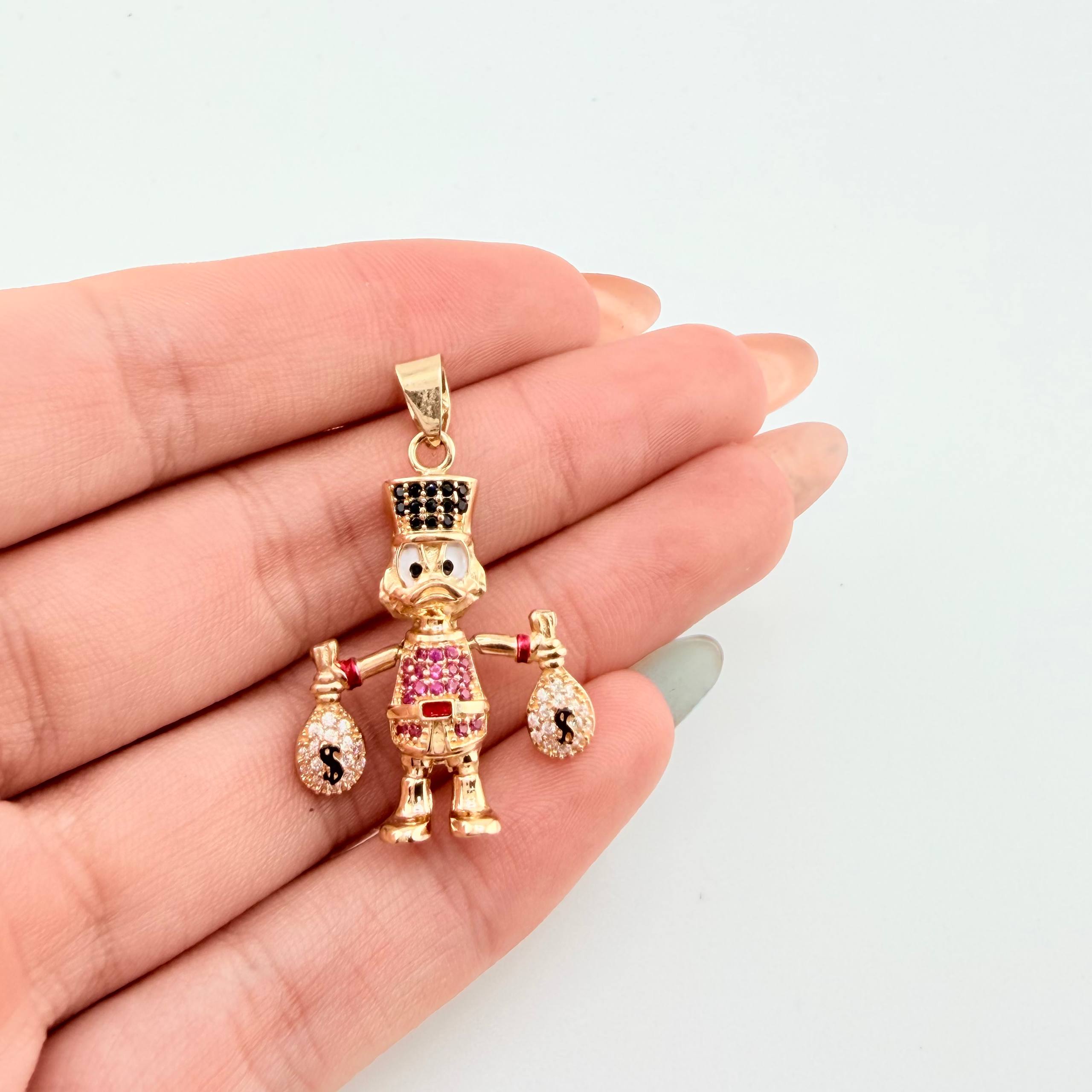 Dije Pato Bolsa Dinero 5gr / 3.5cm / Oro Amarillo 18K ©