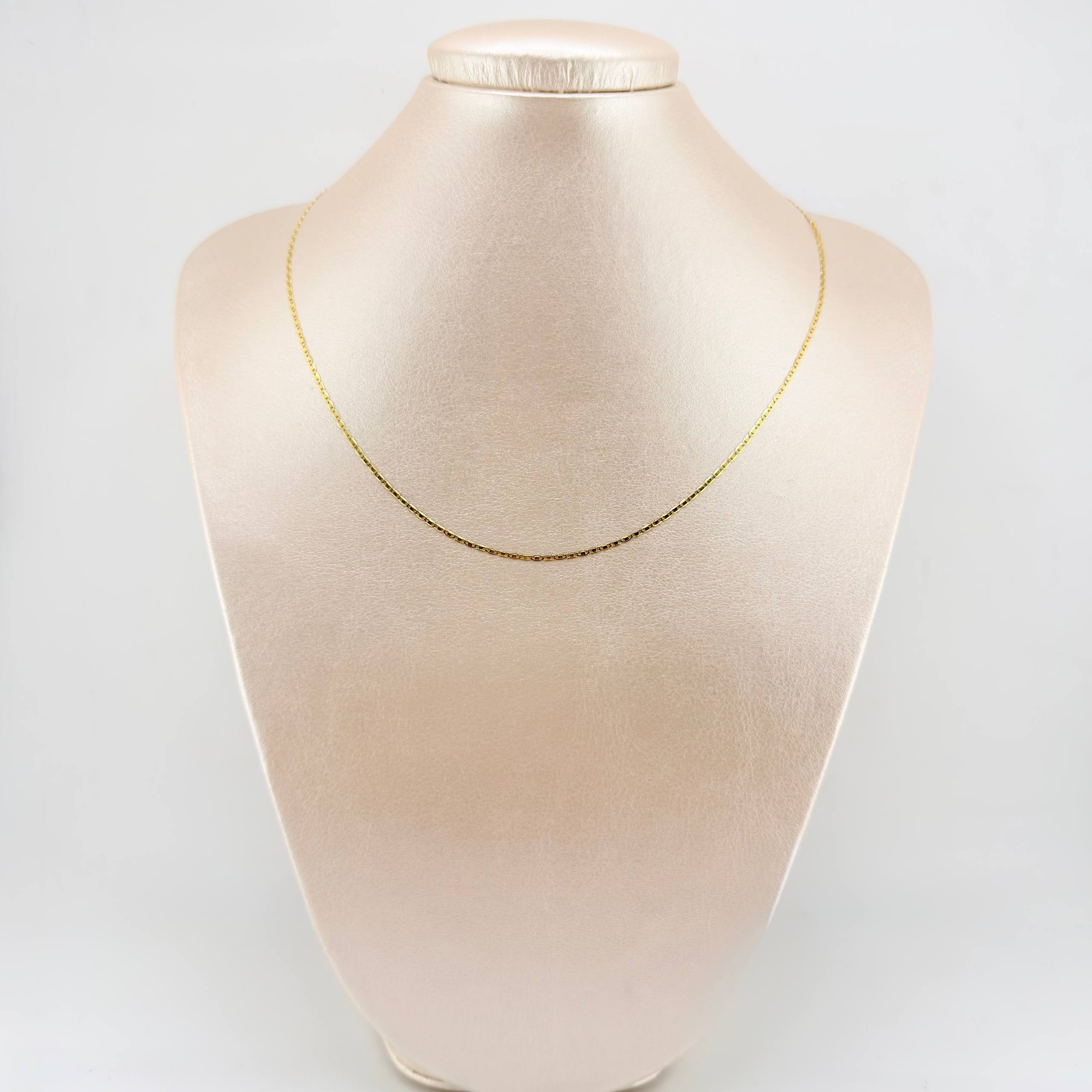 Cadena Plana 1.45gr / 45cm / 1.3mm Oro Amarillo +3 18K