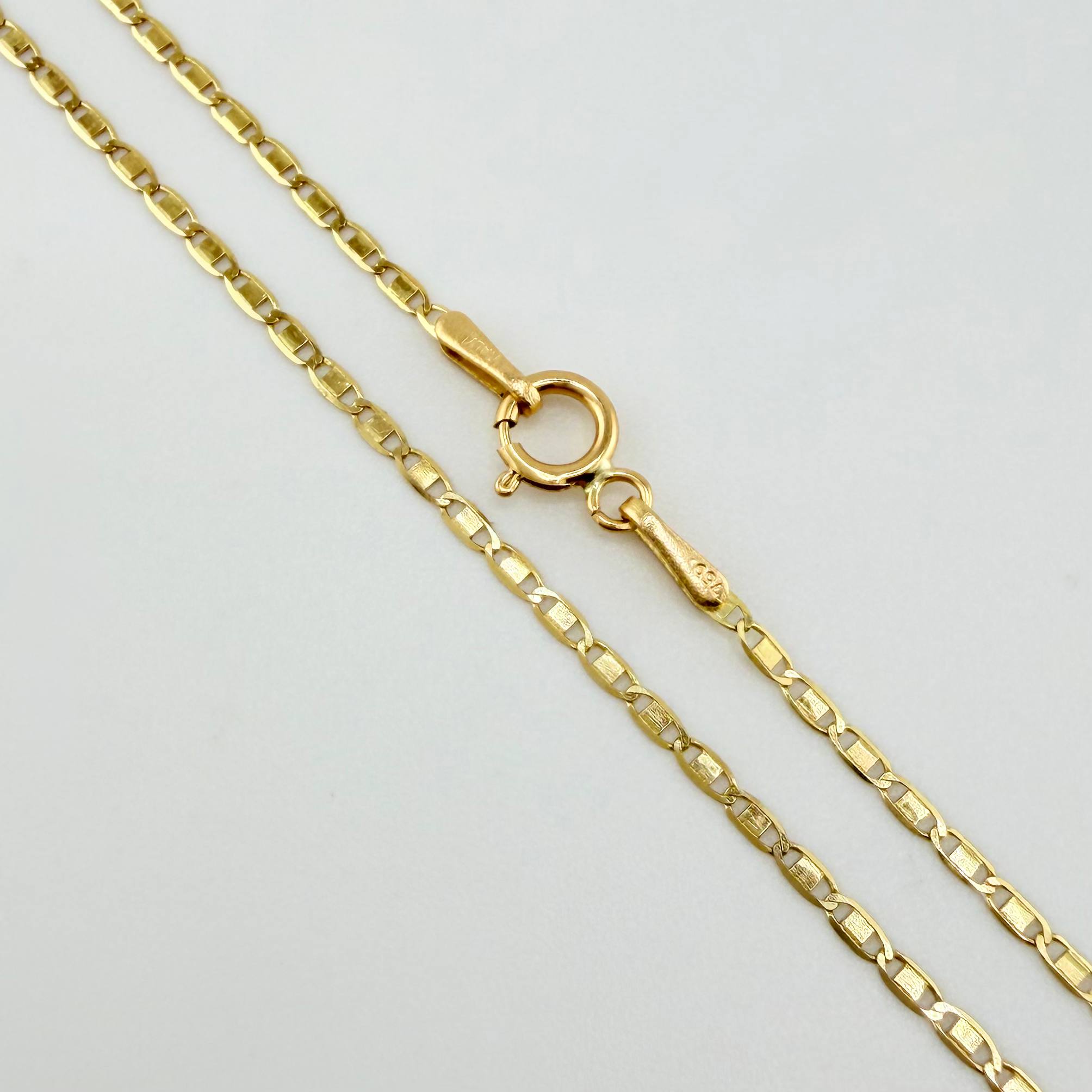 Cadena Plana 1.55gr / 45cm / 1.3mm Oro Amarillo +3 18K