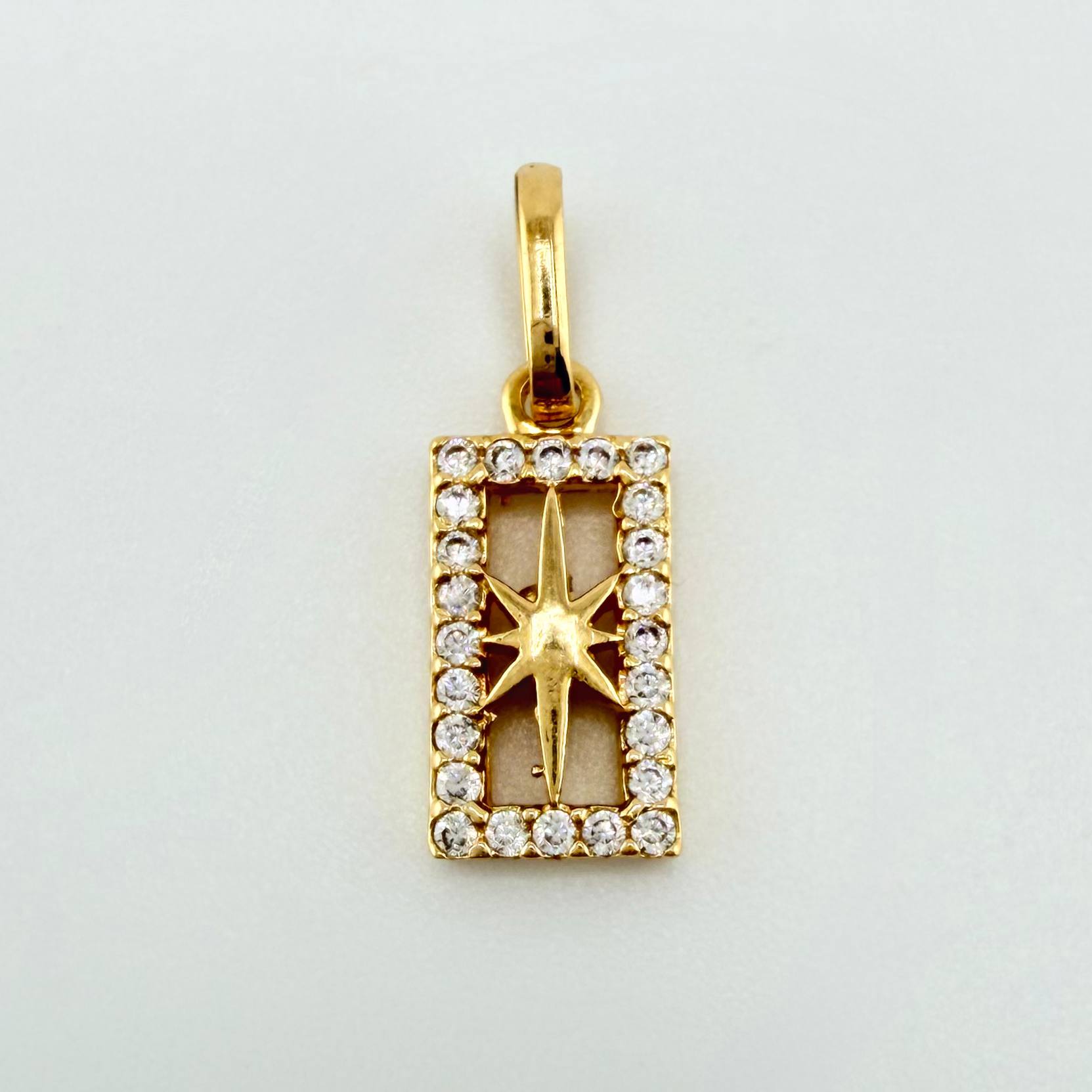 Dije Estrella Cardinal 1.05gr / 1.8cm / Oro Amarillo 18K