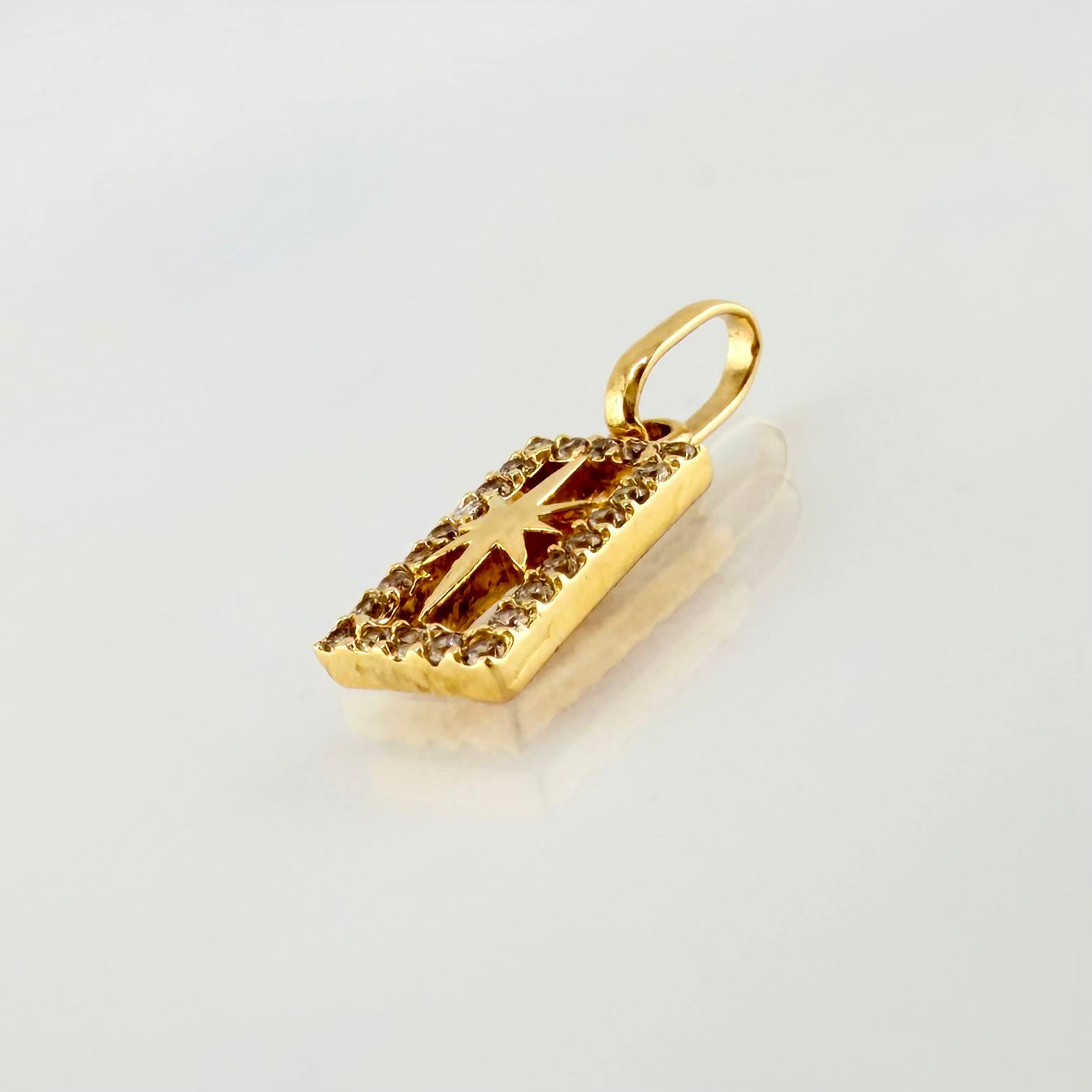 Dije Estrella Cardinal 1.05gr / 1.8cm / Oro Amarillo 18K