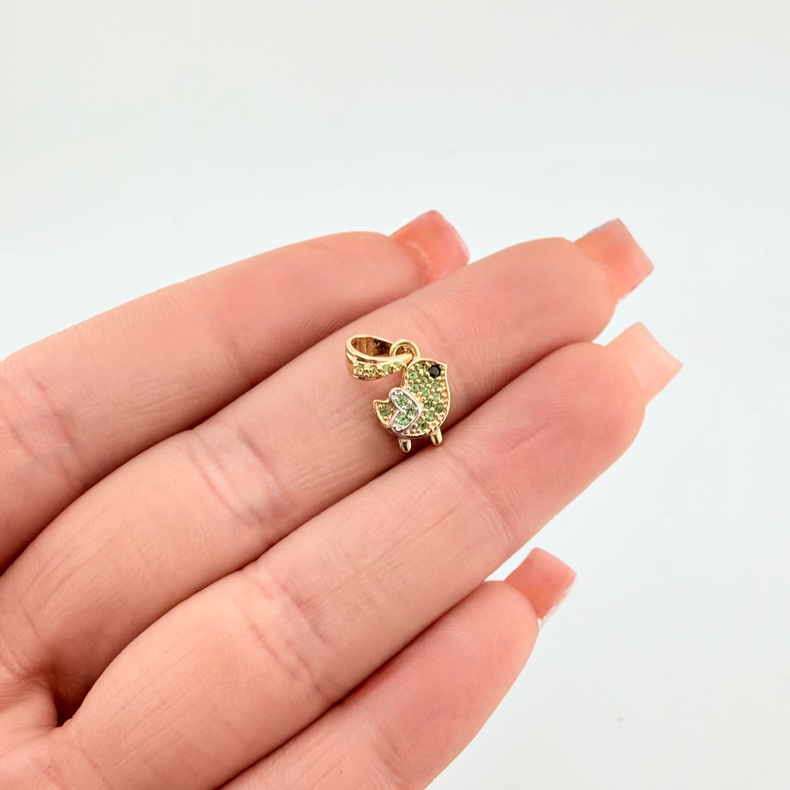 Dije Pajarito 0.95gr / 1.5cm / Dos Oros Amarillo Blanco 18K