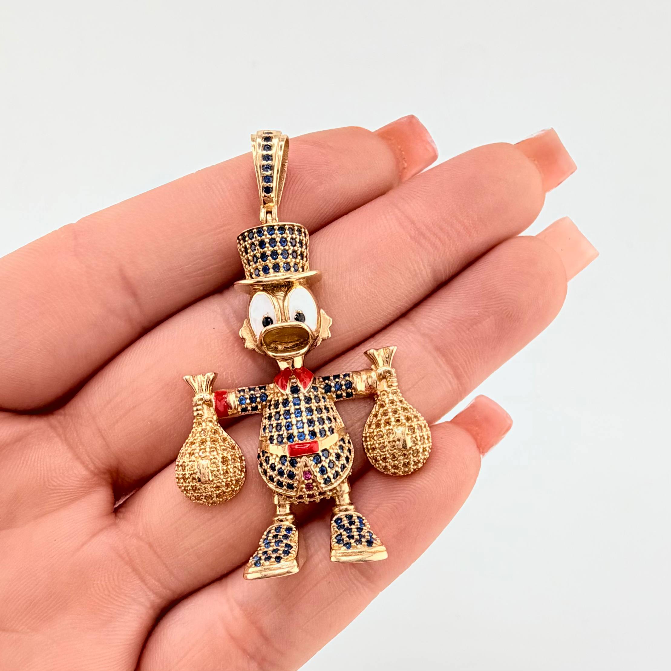 Dije Pato Bolsa Dinero 13.1gr / 5.4cm / Oro Amarillo 18K