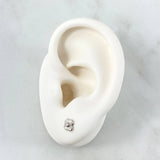 Topos Flor Rayada 0.65gr / 5mm Oro Blanco 18K ©